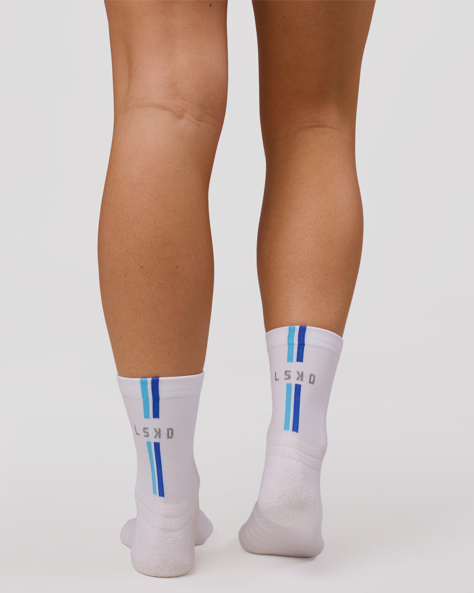 Studio image of Pace Performance Quarter Socks  - White-Open Air