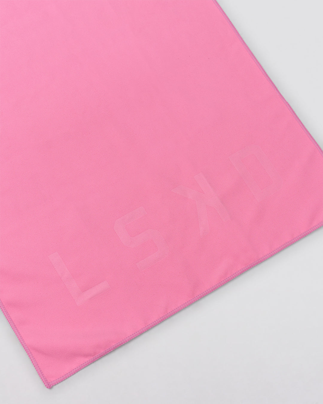 Studio image of Perform Microfibre Lightweight Towel Small - Pink Rose - view 3