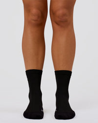 Studio image of Power Performance Quarter Socks - Black-White | Thumbnail Index: 2