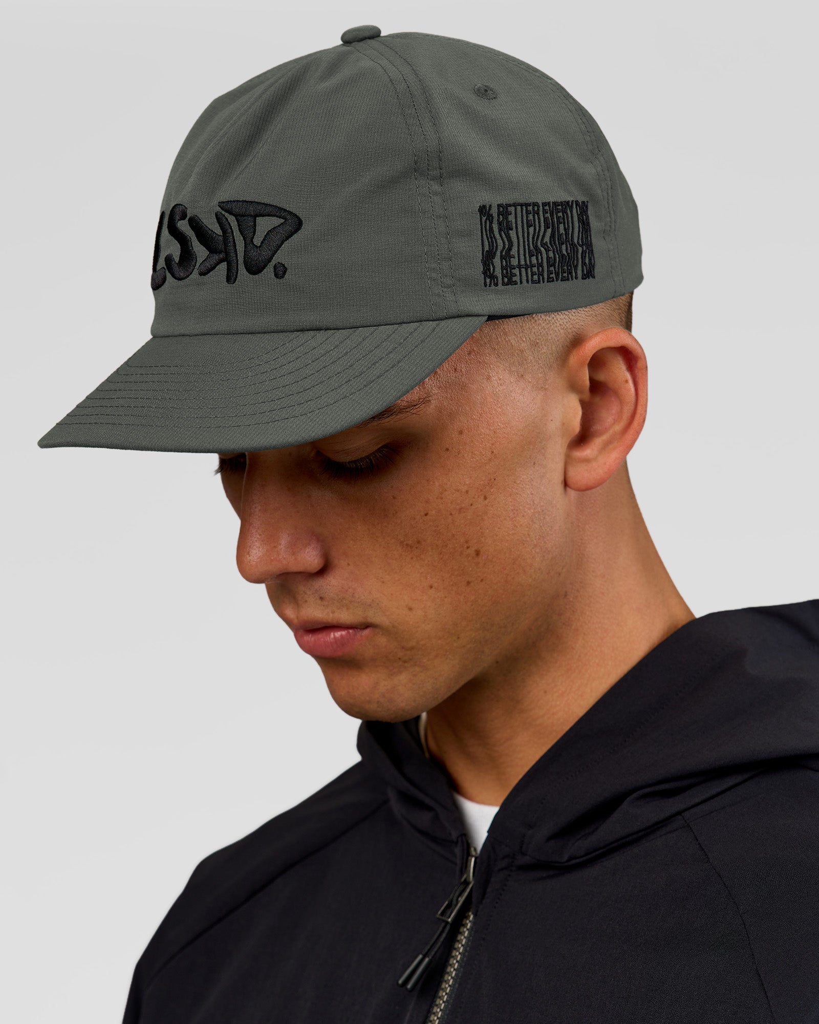 Studio image of Static Grit Pinch Panel Cap - Carbon Green
