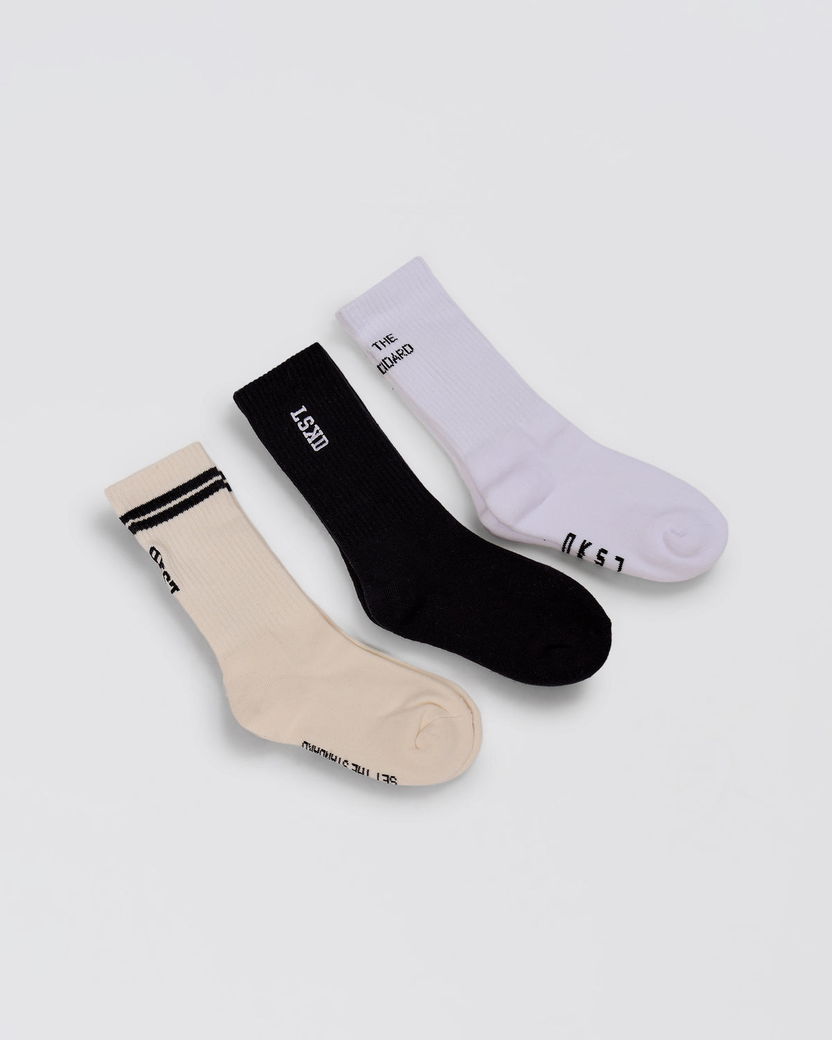 Studio image of The New Standard Crew Socks 3 Pack - Off White-White-Black