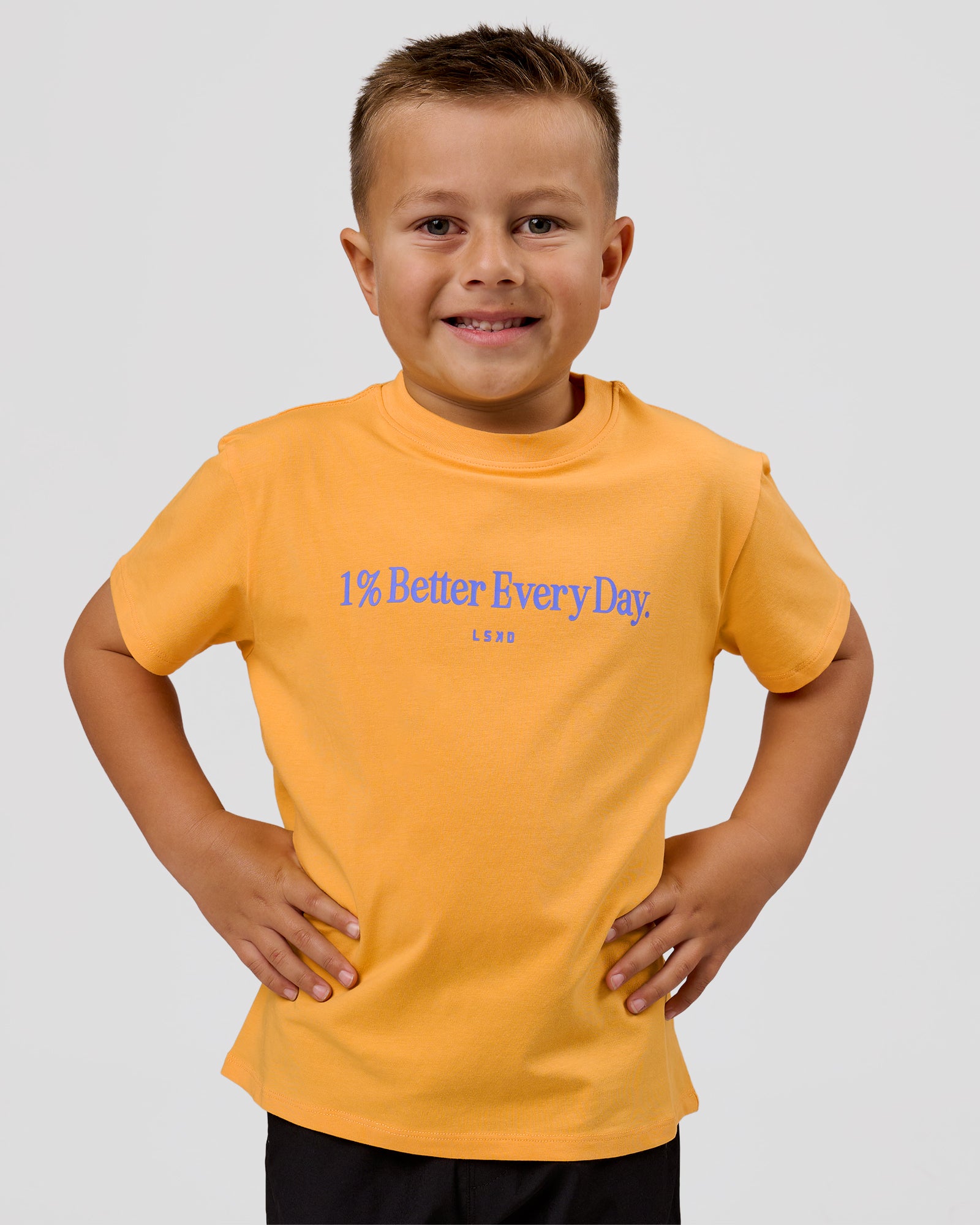 Studio image of VS6 1% Better Kids FLXCotton Tee - Warm Apricot