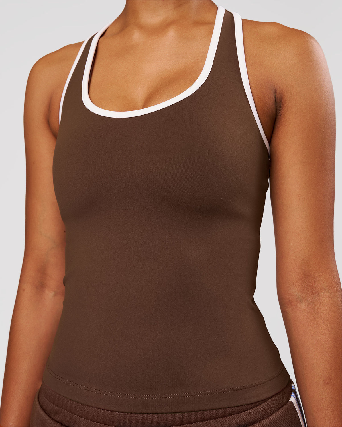 Woman wearing Flow Rep Scoop Neck Tank - Hot Chocolate-White | Model:Jordan | Size:XS