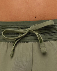 Woman wearing Accelerate 3" Mid-Rise Running Short - Pure Olive-Fog | Model:Xs | Size:ISSY | Thumbnail Index: 5