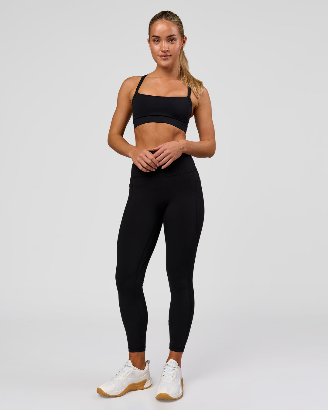 Woman wearing Fusion O.G Ultra High-Rise 7/8 Legging Pockets - Black | Model:Xs | Size:ISSY - view 2