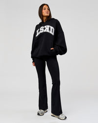 Woman wearing Varsity Boxy Hoodie - Caviar-White | Model:Bianca | Size:L