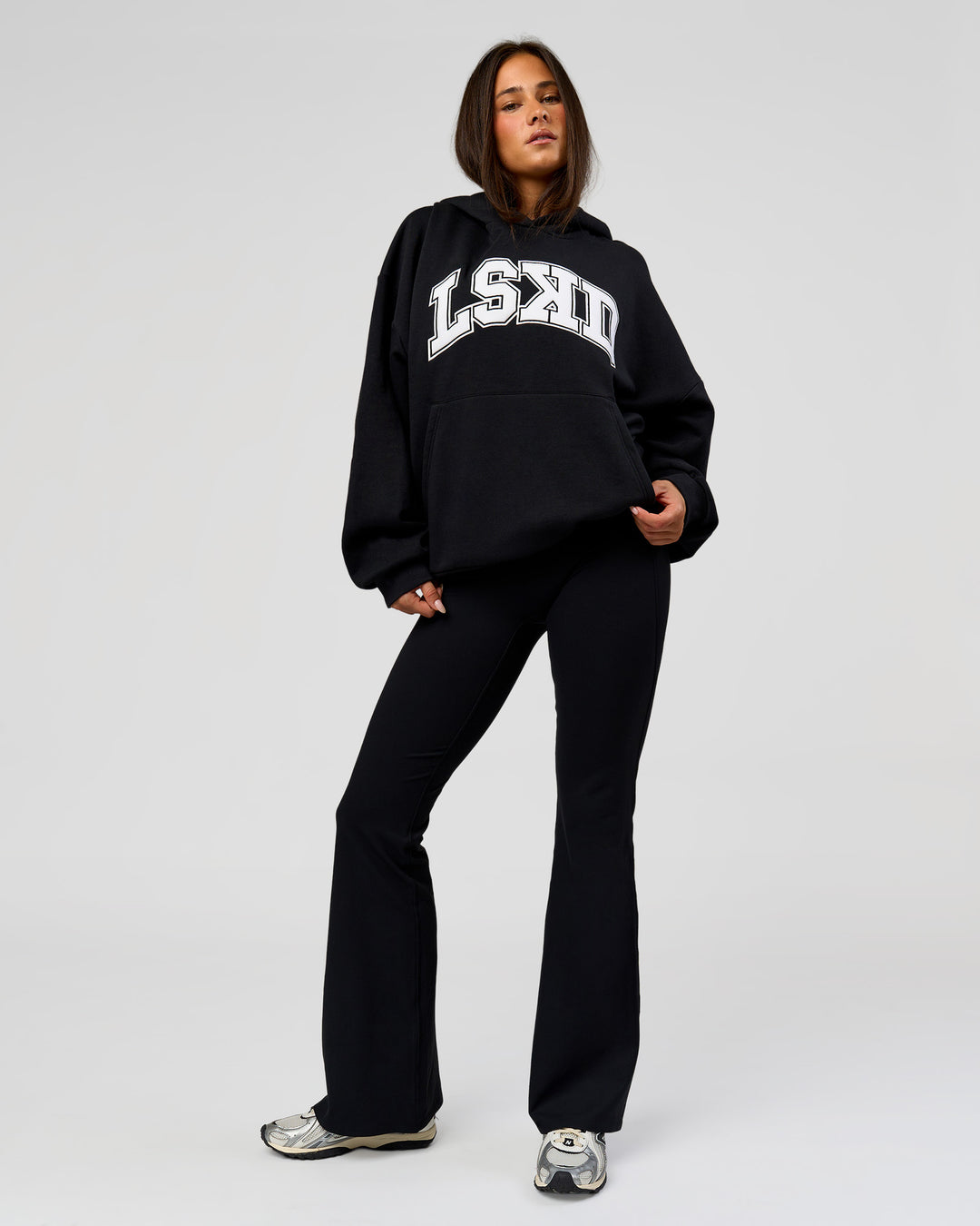 Woman wearing Varsity Boxy Hoodie - Caviar-White | Model:Bianca | Size:L