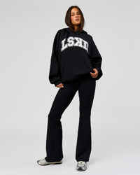 Woman wearing Varsity Boxy Hoodie - Caviar-White | Model:Bianca | Size:L
