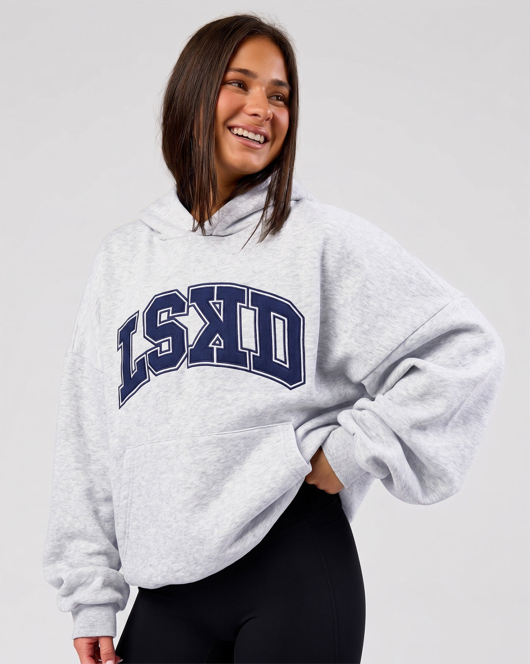 Woman wearing Varsity Boxy Hoodie - Silver Marl-Future Navy | Model:Bianca | Size:L