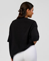 Woman wearing Varsity EST Heavyweight Oversized Tee  - Black-Off White | Model:Bianca | Size:L