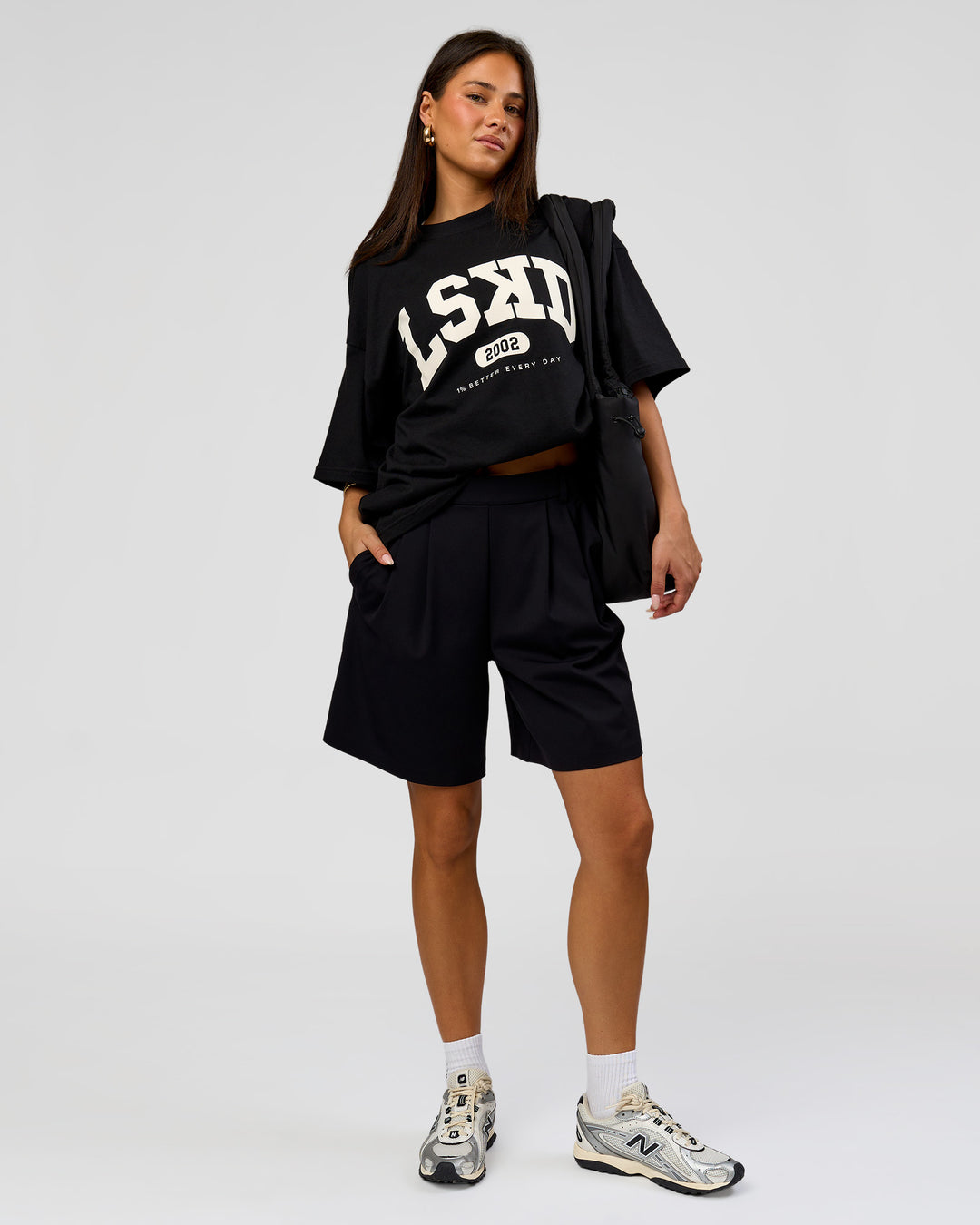 Woman wearing Varsity EST Heavyweight Oversized Tee  - Black-Off White | Model:Bianca | Size:L