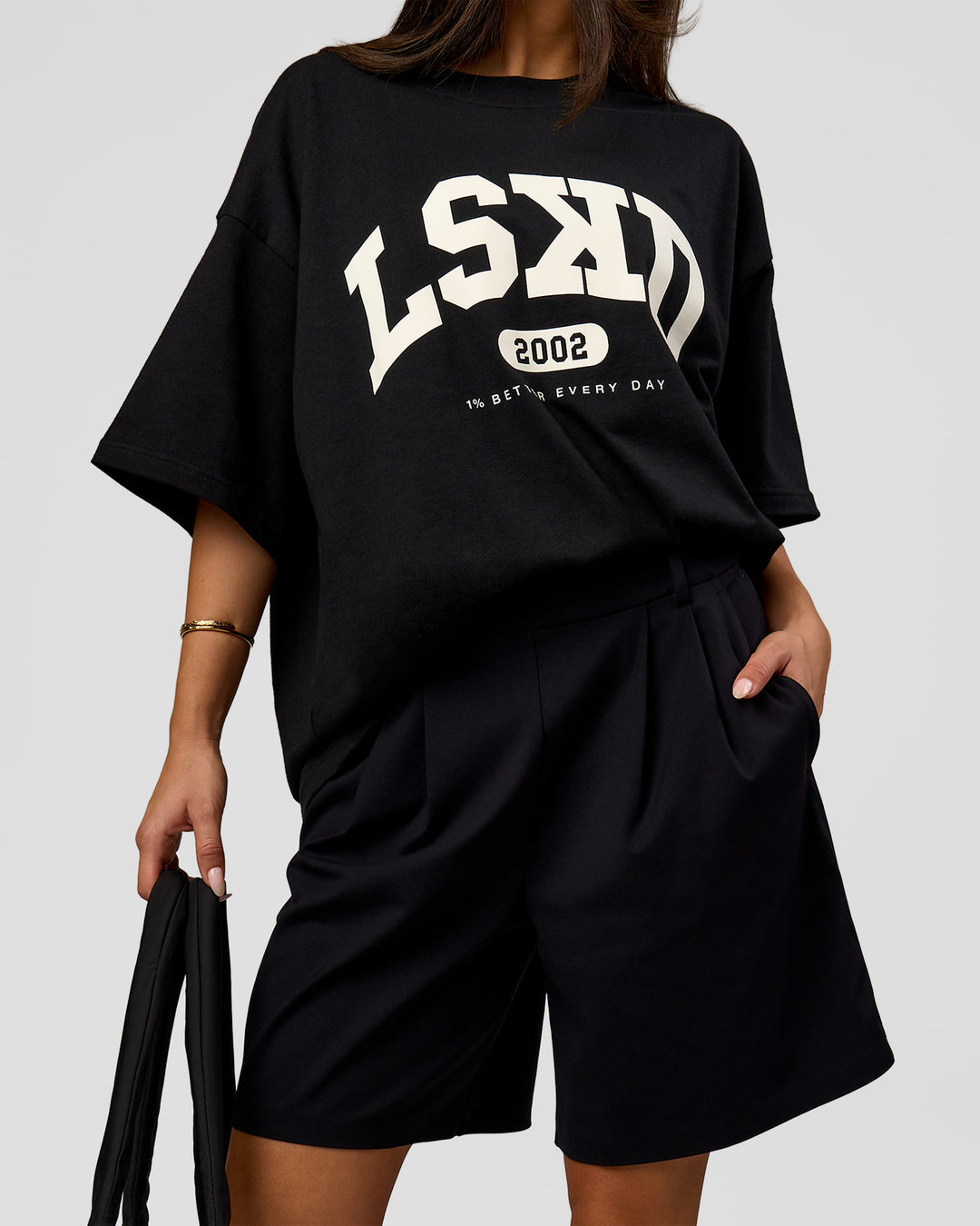 Woman wearing Varsity EST Heavyweight Oversized Tee  - Black-Off White | Model:Bianca | Size:L