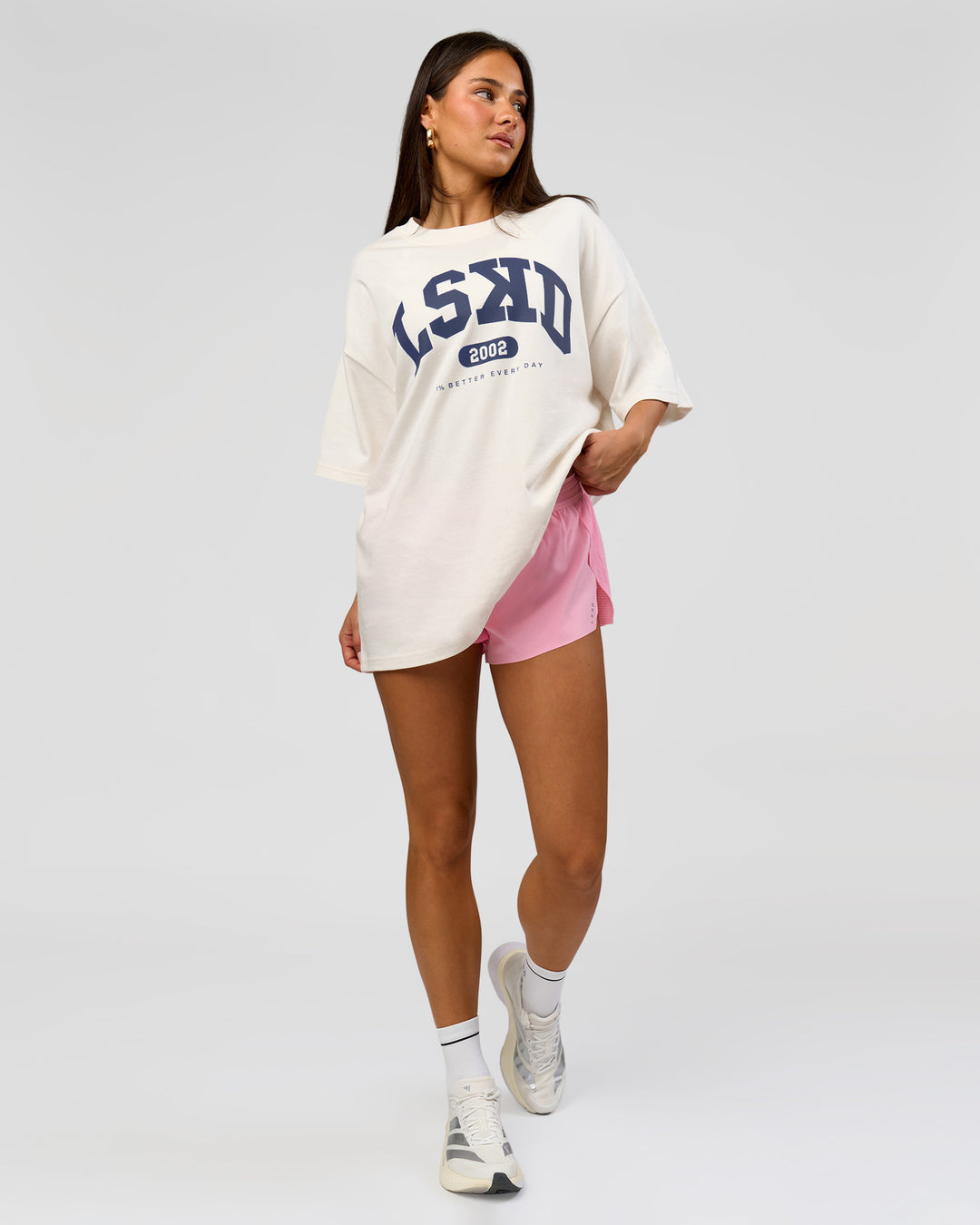 Woman wearing Varsity EST Heavyweight Oversized Tee  - Off White-Future Navy | Model:Bianca | Size:L