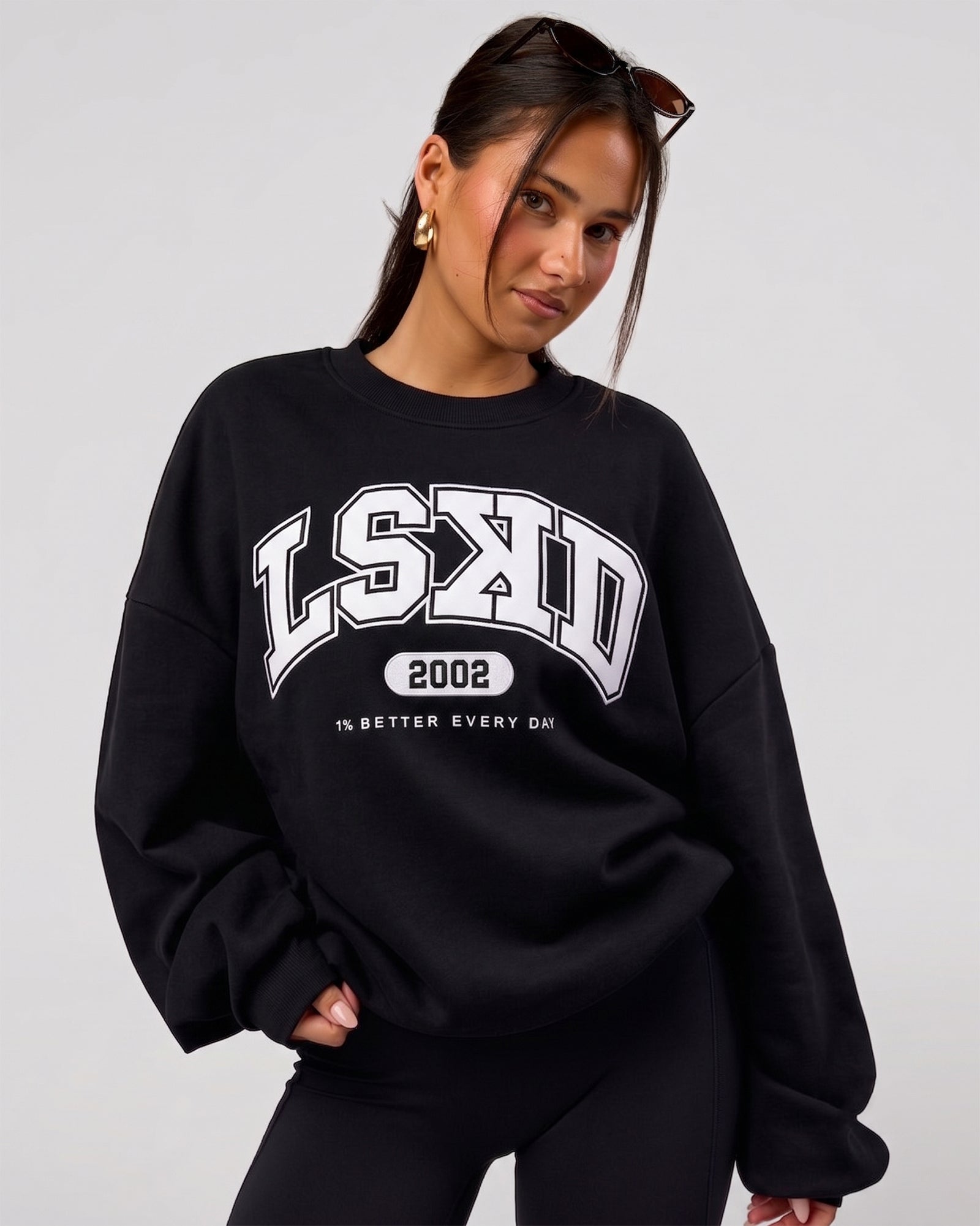 Woman wearing Varsity Boxy Crew in Caviar-Off White | Model:Varsity | Size:L