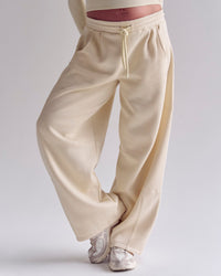 Woman wearing Bree Barrel Fleece Track Pant - Vanilla Bean | Model:Bree | Size:M | Thumbnail Index: 6