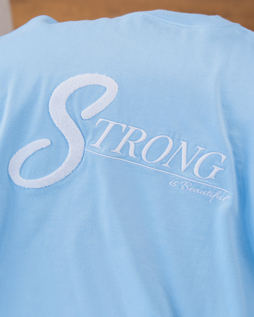Woman wearing Strong is Beautiful Heavyweight Oversized Tee - Open Air | Model:Charlotte | Size:M - view 13