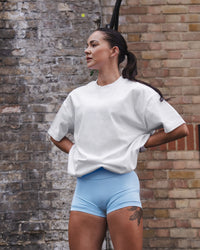 Woman wearing Strong is Beautiful Heavyweight Oversized Tee - White | Model:Charlotte | Size:M | Thumbnail Index: 14