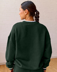 Woman wearing Go-To Dual Oversized Sweater - Midnight Green-White | Model:Meg | Size:M | Thumbnail Index: 3