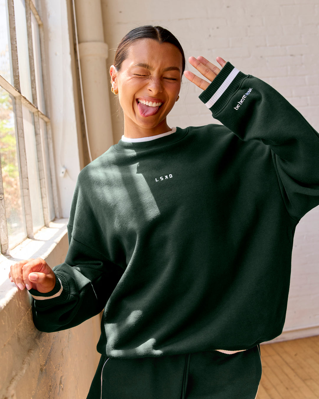 Woman wearing Go-To Dual Oversized Sweater - Midnight Green-White | Model:Meg | Size:M - view 7