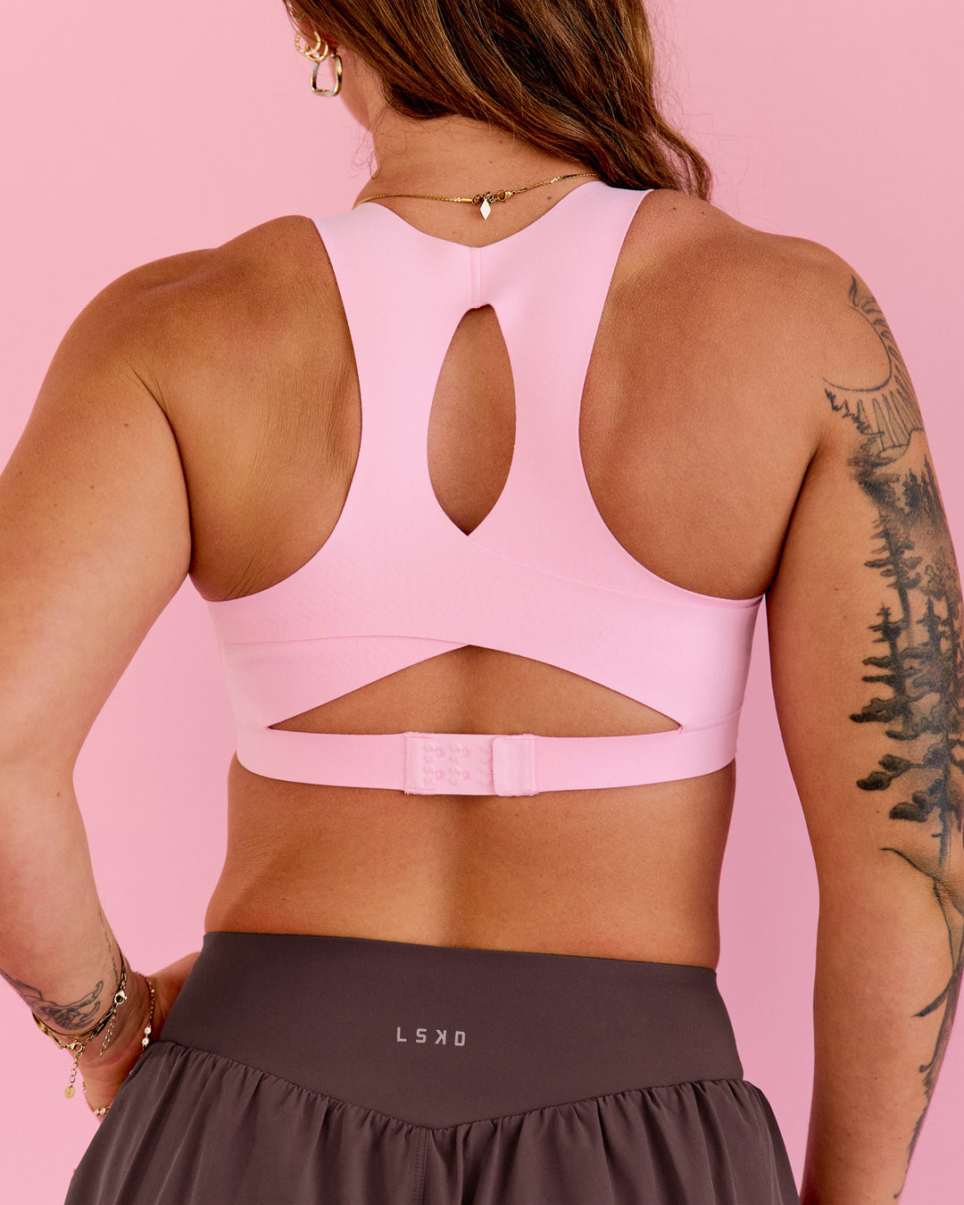 Woman wearing Fusion Sports Bra 2.0 - Pink Rose | Model:Robyn | Size:M - view 12