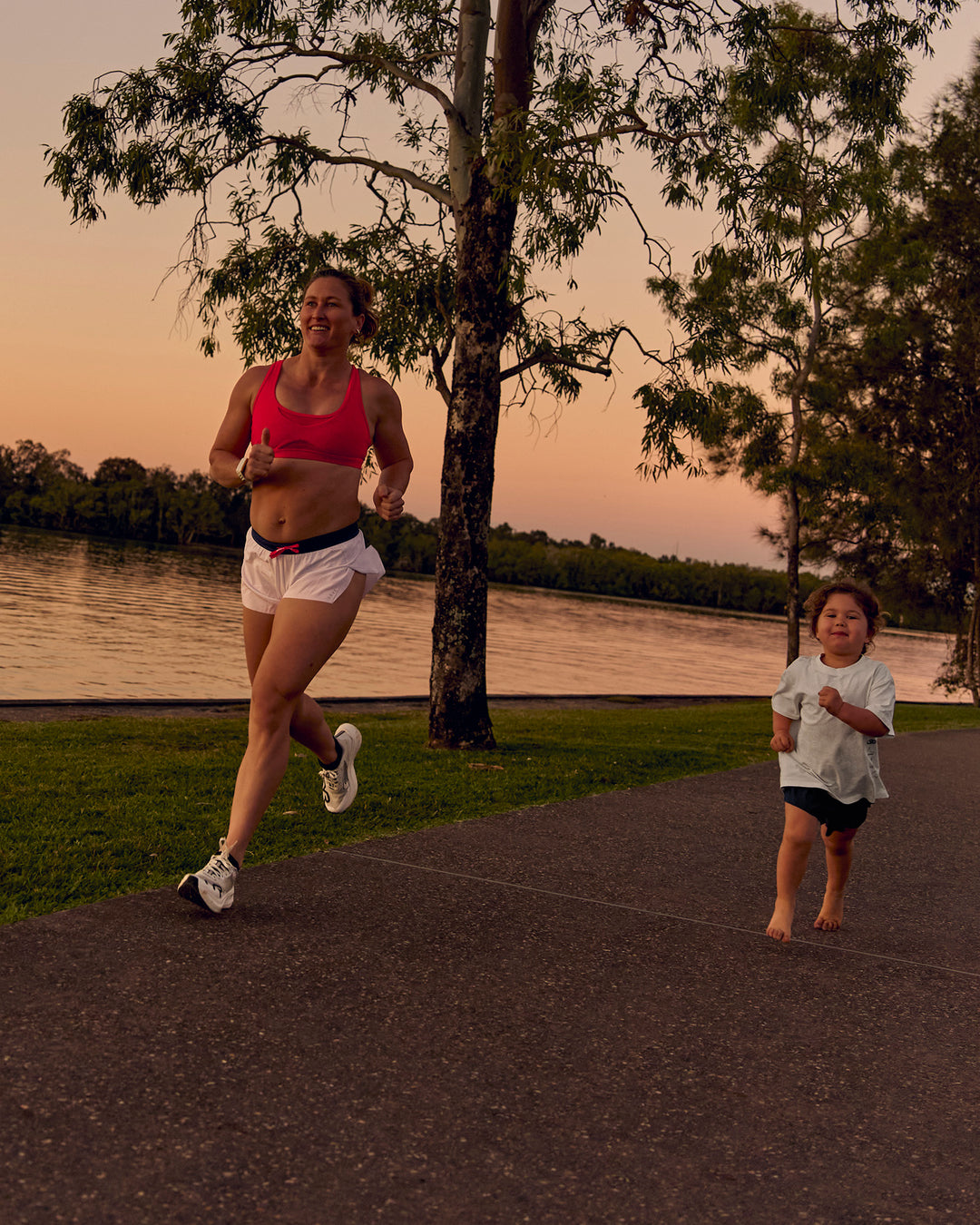 Woman wearing Accelerate 3" Mid-Rise Running Short - White-Future Navy | Model:Tia | Size:M - view 16