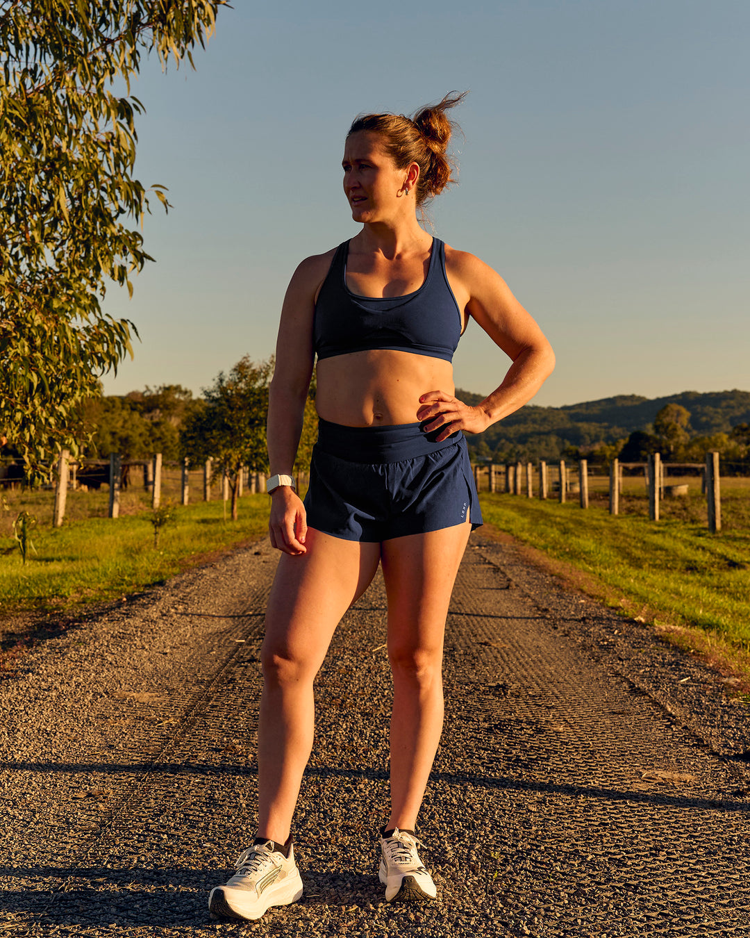 Woman wearing Tia-Clair Toomey-Orr Accelerate 3" Storage Running Short - Future Navy | Model:Tia | Size:M - view 16