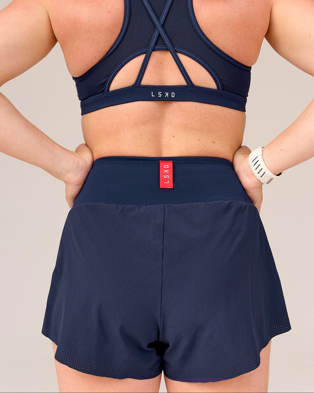 Woman wearing Tia-Clair Toomey-Orr Accelerate 3" Storage Running Short - Future Navy | Model:Tia | Size:M - view 14