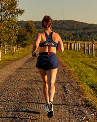 Woman wearing Tia-Clair Toomey-Orr Accelerate 3" Storage Running Short - Future Navy | Model:Tia | Size:M | Thumbnail Index: 4