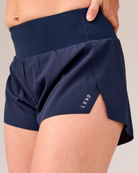 Woman wearing Tia-Clair Toomey-Orr Accelerate 3" Storage Running Short - Future Navy | Model:Tia | Size:M | Thumbnail Index: 5