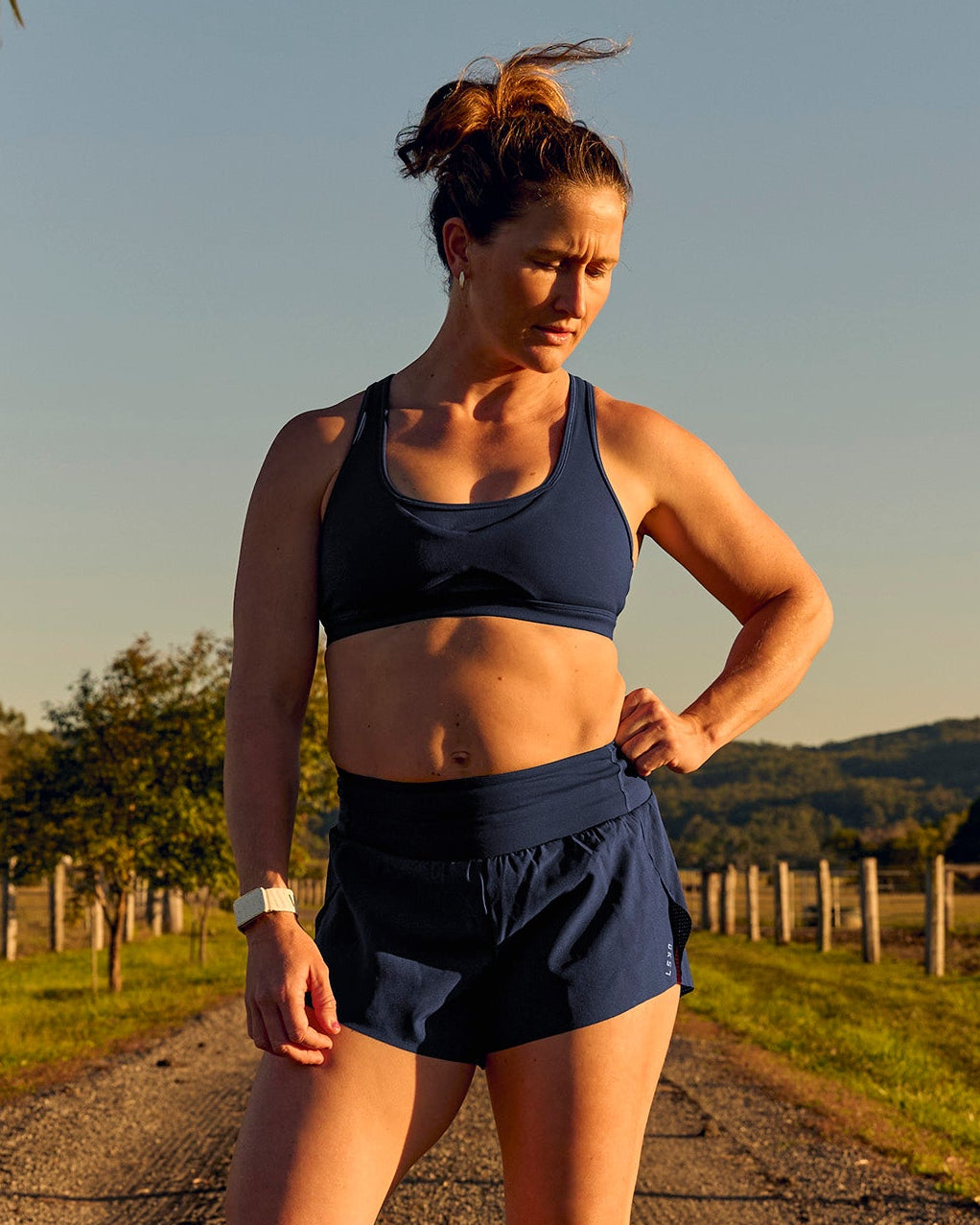 Woman wearing Tia-Clair Toomey-Orr Accelerate 3" Storage Running Short - Future Navy | Model:Tia | Size:M - view 1