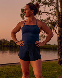 Woman wearing Tia-Clair Toomey-Orr Legacy 3" Run One-Piece - Future Navy | Model:Tia | Size:M | Thumbnail Index: 22