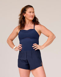 Woman wearing Tia-Clair Toomey-Orr Legacy 3" Run One-Piece - Future Navy | Model:Tia | Size:M | Thumbnail Index: 0