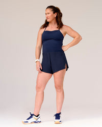Woman wearing Tia-Clair Toomey-Orr Legacy 3" Run One-Piece - Future Navy | Model:Tia | Size:M | Thumbnail Index: 20
