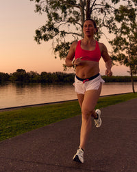 Woman wearing Unstoppable Racerback Sports Bra - Scarlet | Model:Tia | Size:M | Thumbnail Index: 13