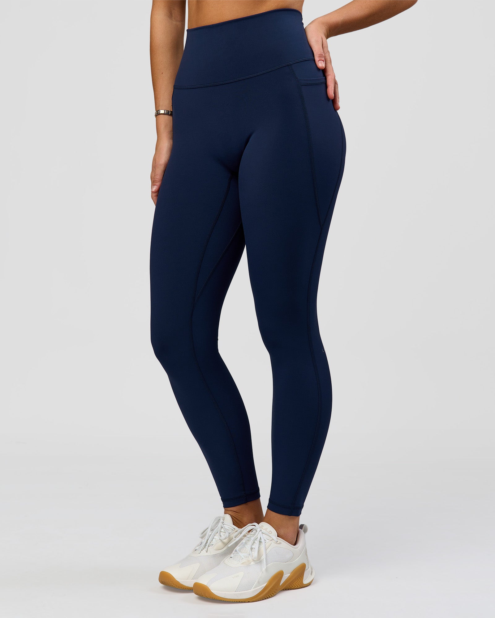 Woman wearing O.G. Fusion Ultra High-Rise Full Length Legging Pockets - Future Navy | Model:Amity| Size:S