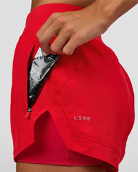 Woman wearing Challenger 3" Lined Performance Short - Scarlet | Model:Amity | Size:S