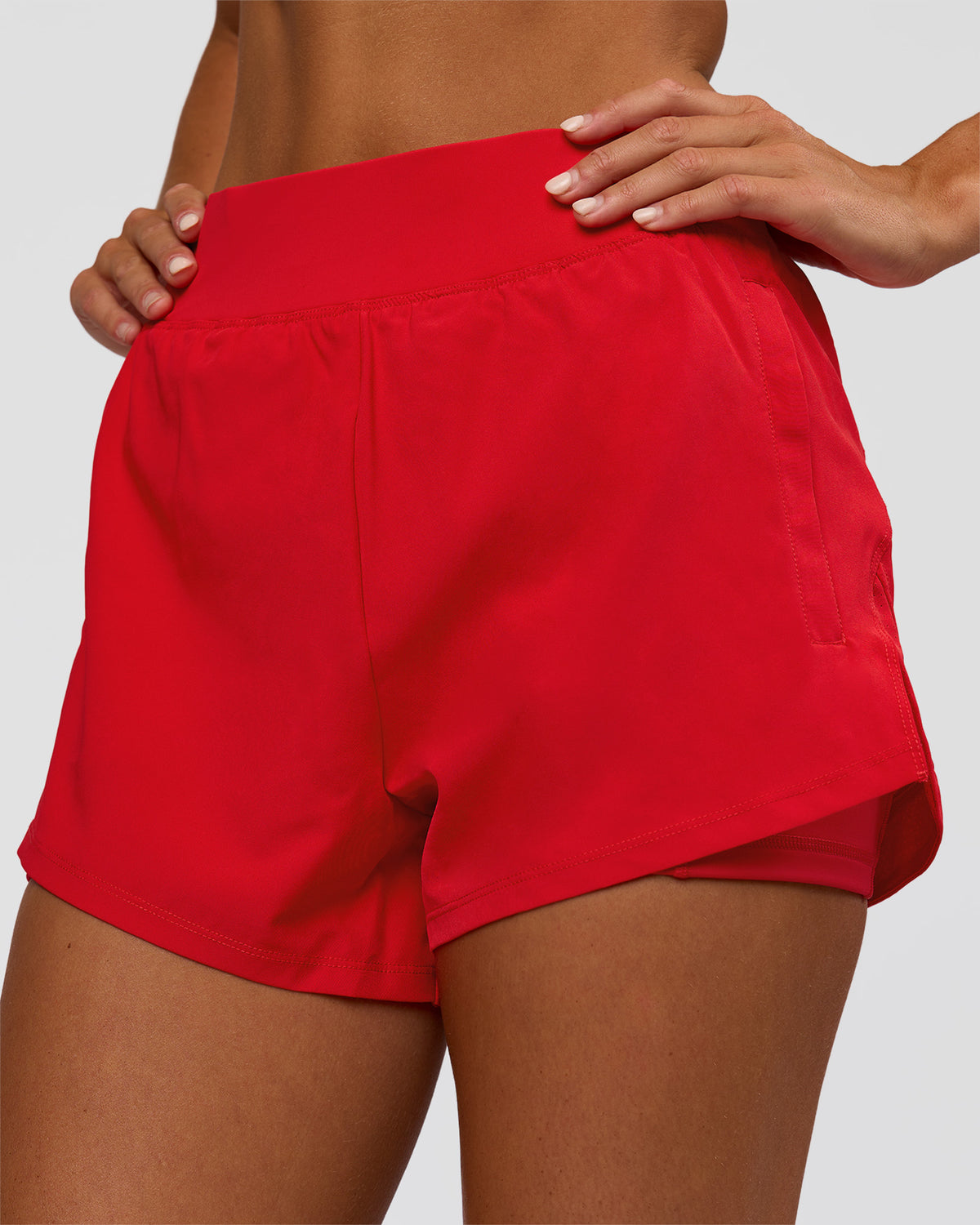 Woman wearing Challenger 3" Lined Performance Short - Scarlet | Model:Amity | Size:S