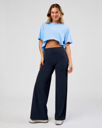 Woman wearing Elixir High-Rise Pant - Midnight Navy | Model:Amity | Size:S | Thumbnail Index: 1