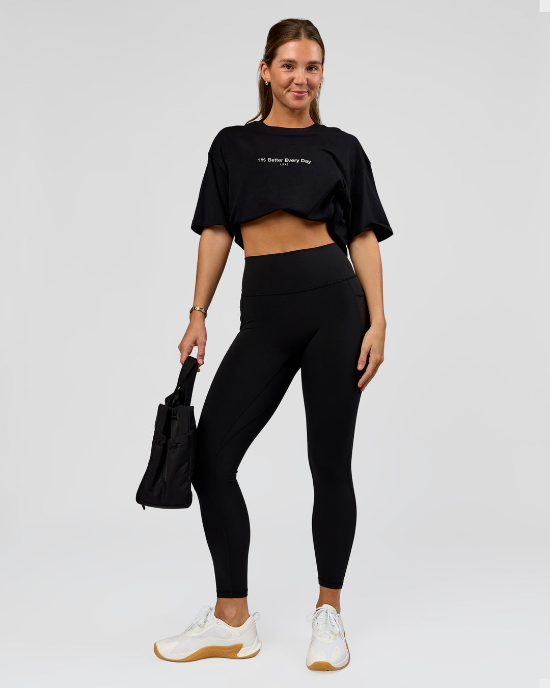 Woman wearing O.G. Fusion High-Rise Full Length Legging Pockets - Black | Model:Amity | Size:S - view 1