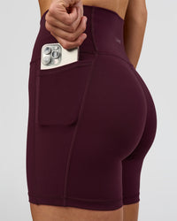 Woman wearing O.G. Fusion Ultra High-Rise 6" Short Pockets - Cherry Lacquer | Model:Amity | Size:S | Thumbnail Index: 4