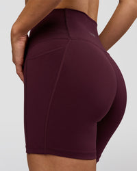 Woman wearing O.G. Fusion Ultra High-Rise 6" Short Pockets - Cherry Lacquer | Model:Amity | Size:S | Thumbnail Index: 5