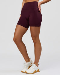 Woman wearing O.G. Fusion Ultra High-Rise 6" Short Pockets - Cherry Lacquer | Model:Amity | Size:S | Thumbnail Index: 7
