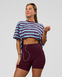 Woman wearing O.G. Fusion Ultra High-Rise 6" Short Pockets - Cherry Lacquer | Model:Amity | Size:S | Thumbnail Index: 1