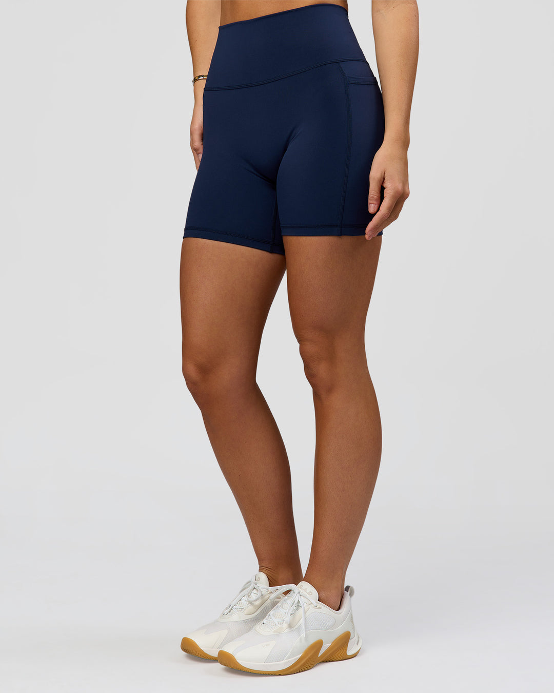 Woman wearing O.G. Fusion Ultra High-Rise 6" Short Pockets - Future Navy | Model:Amity | Size:S - view 8