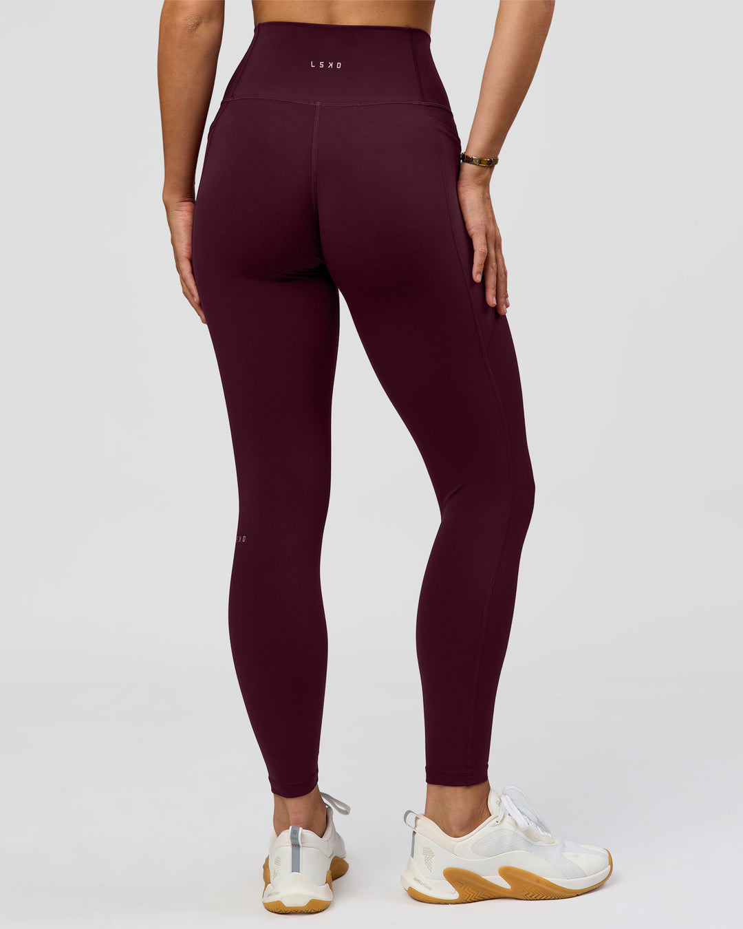 Woman wearing O.G. Fusion Ultra High-Rise Full Length Legging Pockets - Cherry Lacquer | Model:Amity | Size:S - view 5