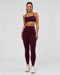 Woman wearing O.G. Fusion Ultra High-Rise Full Length Legging Pockets - Cherry Lacquer | Model:Amity | Size:S | Thumbnail Index: 3