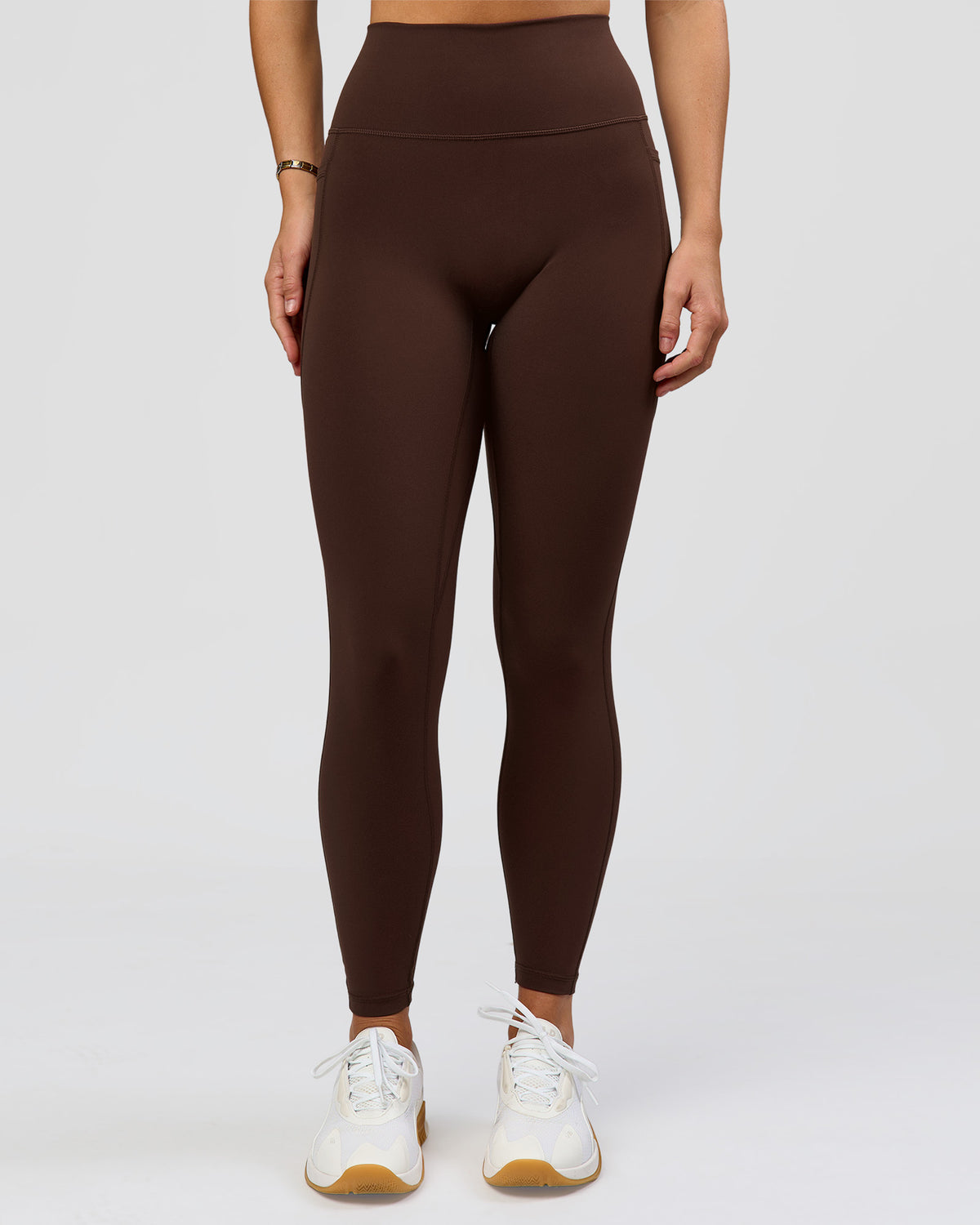 Woman wearing O.G. Fusion Ultra High-Rise Full Length Legging Pockets - Hot Chocolate | Model:Amity | Size:S - view 1