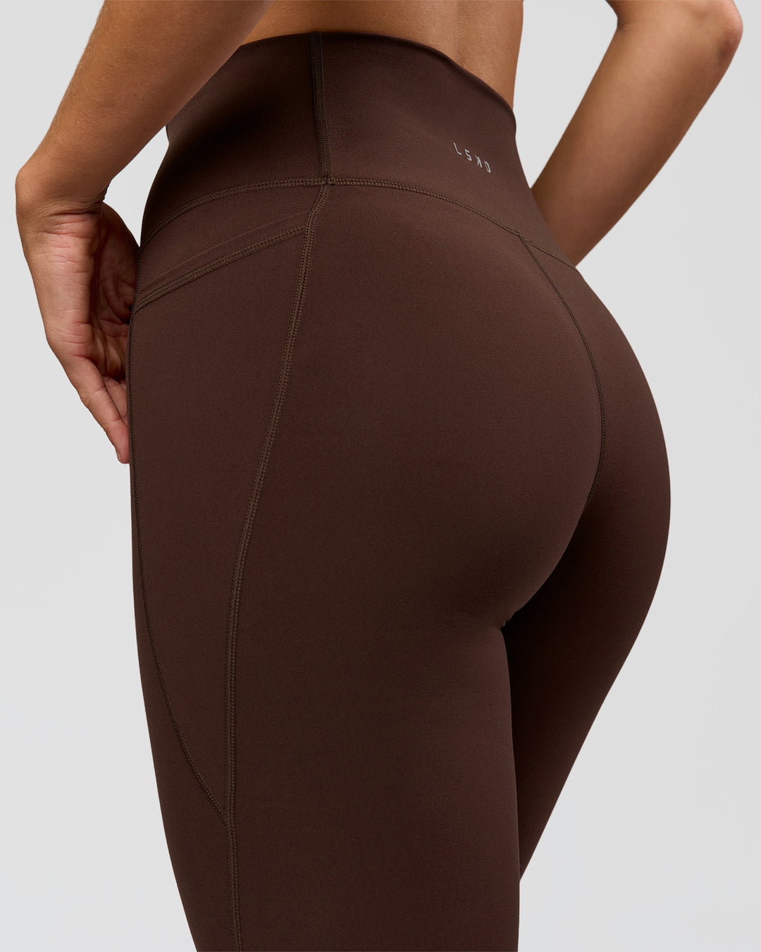 Woman wearing O.G. Fusion Ultra High-Rise Full Length Legging Pockets - Hot Chocolate | Model:Amity | Size:S - view 6