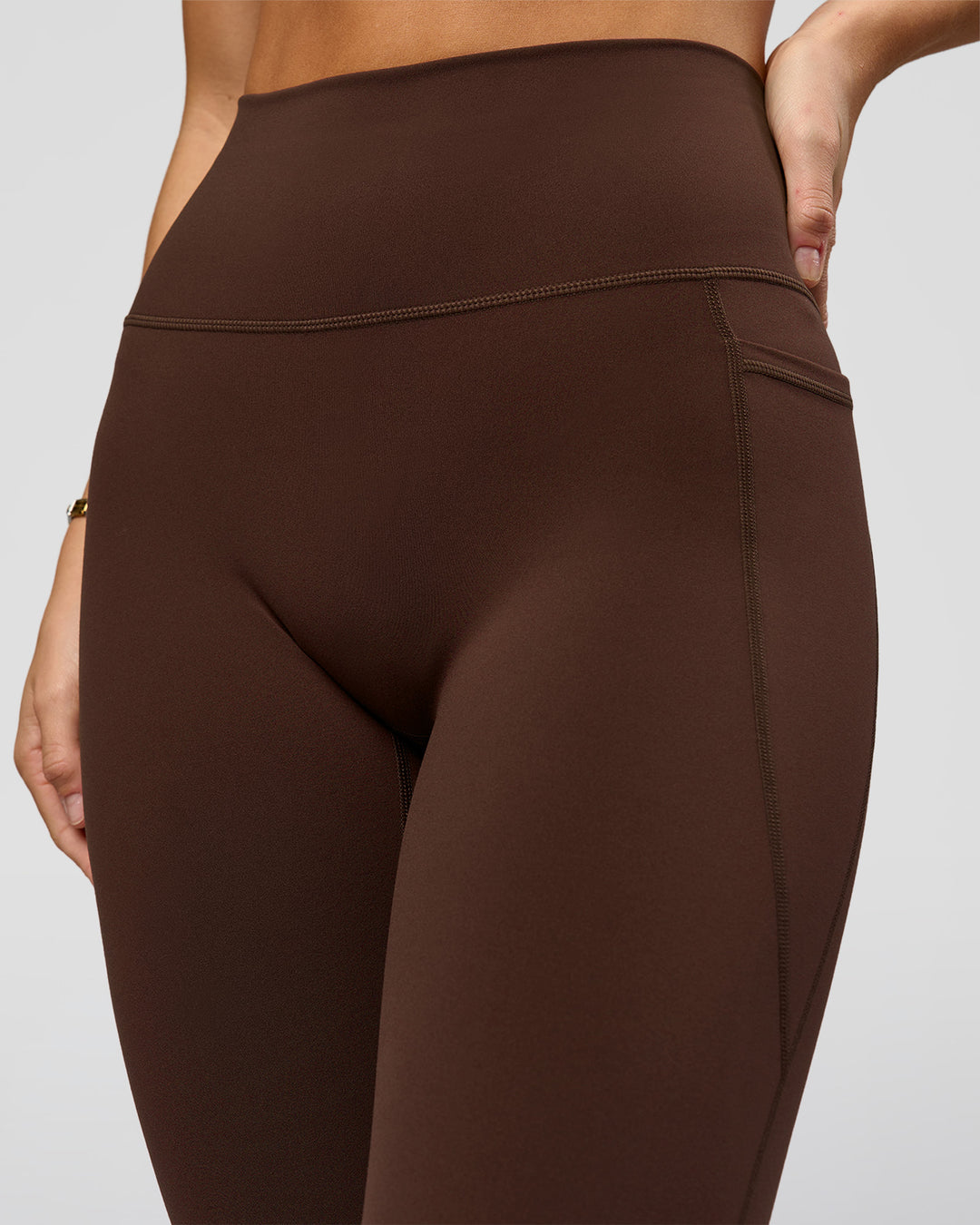 Woman wearing O.G. Fusion Ultra High-Rise Full Length Legging Pockets - Hot Chocolate | Model:Amity | Size:S - view 7