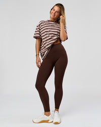Woman wearing O.G. Fusion Ultra High-Rise Full Length Legging Pockets - Hot Chocolate | Model:Amity | Size:S | Thumbnail Index: 0